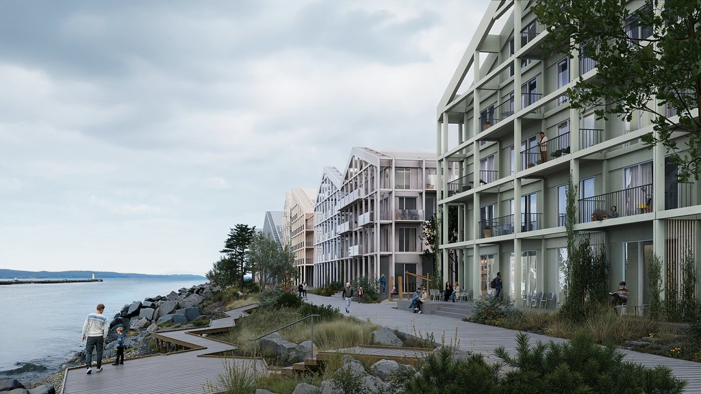 Husrekke med gang og sykkelvei langs ei elv