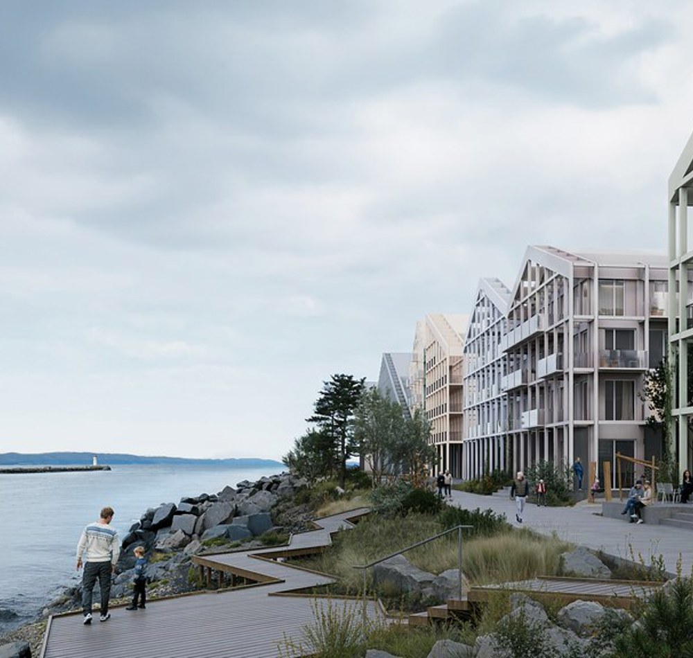 Husrekke med gang og sykkelvei langs ei elv